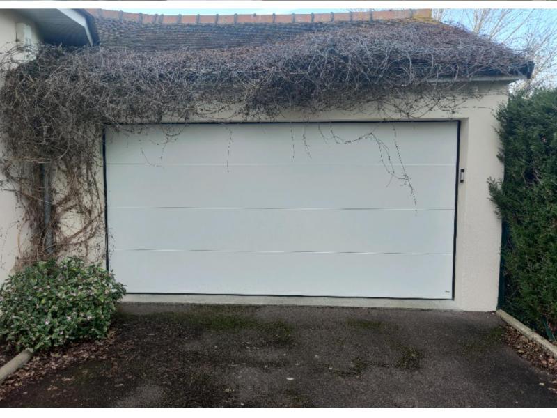 Remplacement d’une porte de garage à Ranville